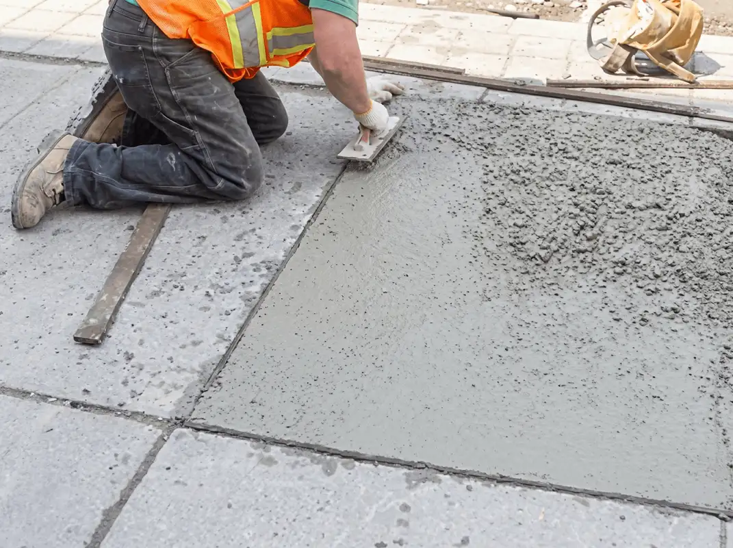 Professional repairing a concrete floor in Denver, CO